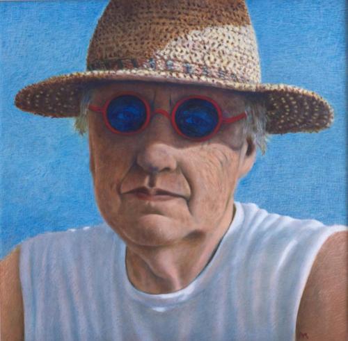 Zelfportret met stro hoed